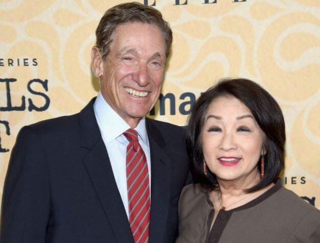 Amy Povich's father, Maury Povich, with his wife, Connie Chung.